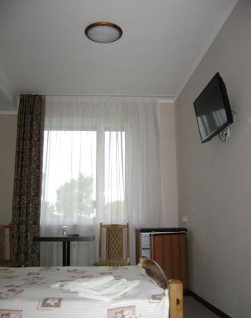 Фото номера Стандартный двухместный номер с 1 кроватью Отель Hotel Olgas г. Глубокое 5