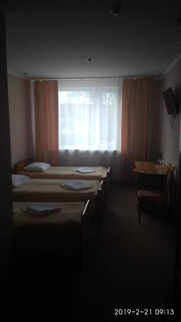 Фото номера Трехместный номер Отель Hotel Olgas г. Глубокое 7